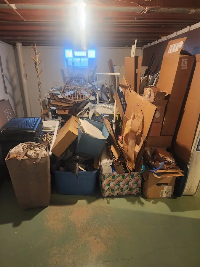 Roll-off dumpster container at job site for 6 Yard Dumpster Rental in Hampton